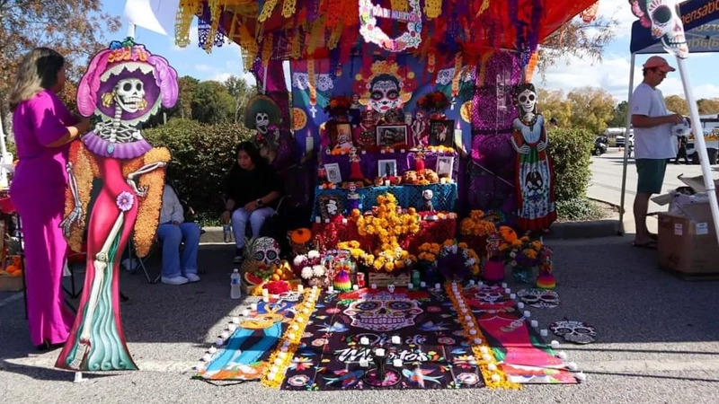 Colorful vendor display at the Day of the Dead festival.