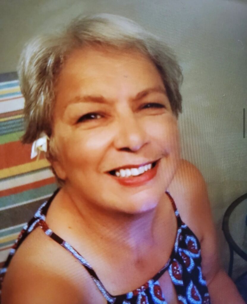 Smiling woman with short hair looking up