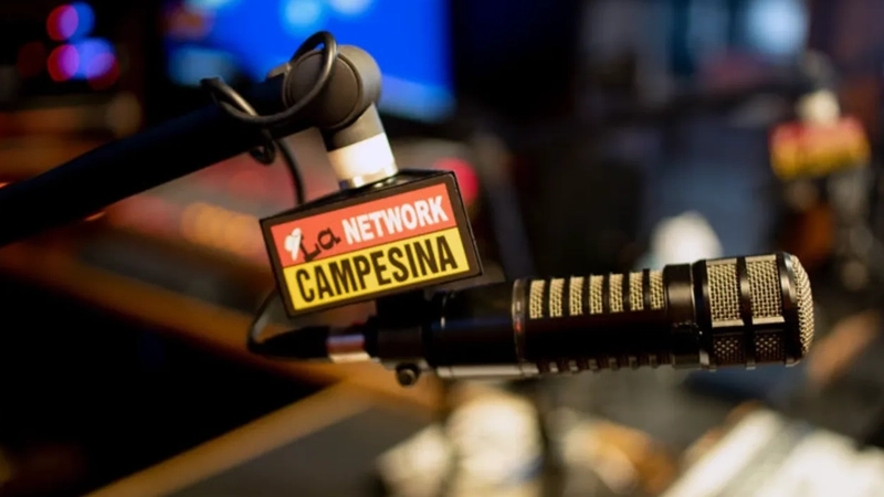 Close-up of microphone with label La Network Campesina