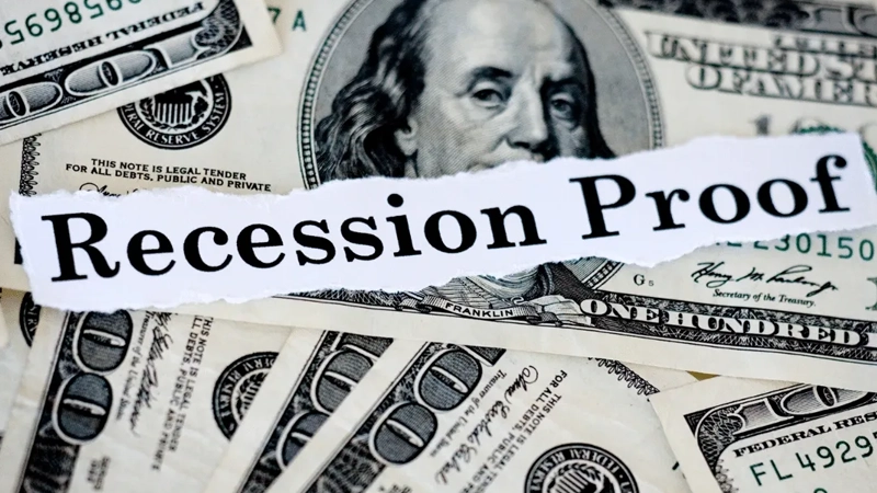 Illustration of layers of money with title Recession Proof layered on top