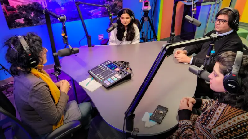 People record a conversation in a recording studio