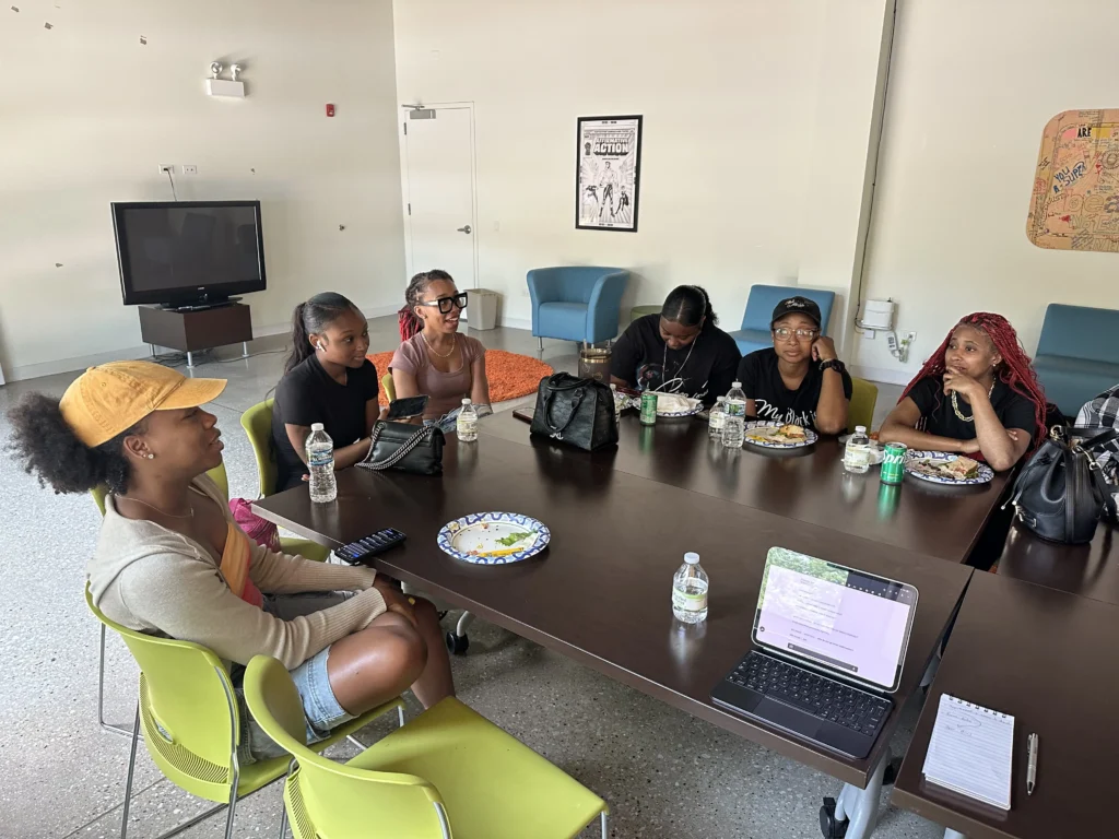Youth discuss during a community listening session